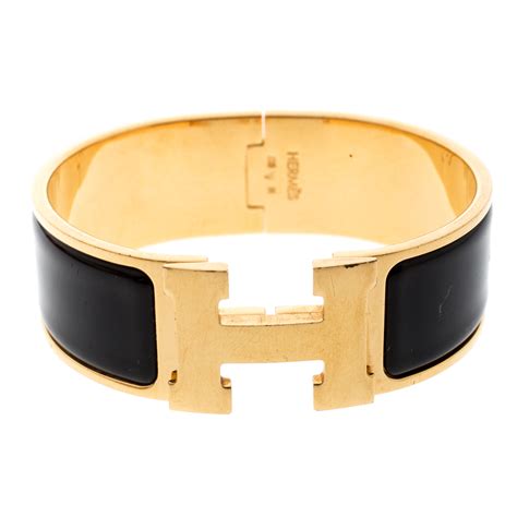 black bracelet hermes|Hermes black and gold bracelet.